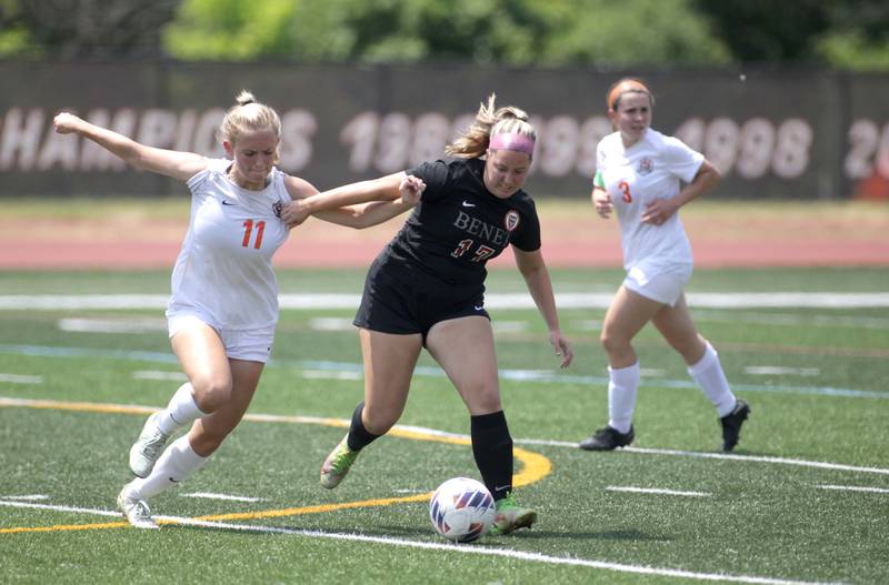 Crystal Lake Central’s Madeline Gray (left) and Benet’s Rachel Burns go after the ball during a Class 2A girls state soccer semifinal at North Central College in Naperville on Friday, June 2, 2023.
