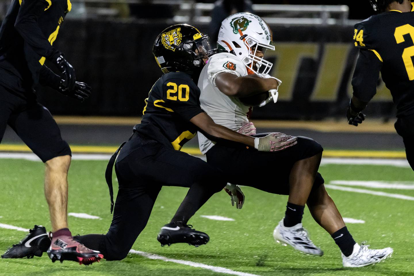 Joliet West's Marcus Jones tackles Plainfield East's David Croom during a varsity football game against at Joliet West on Oct. 10, 2025.