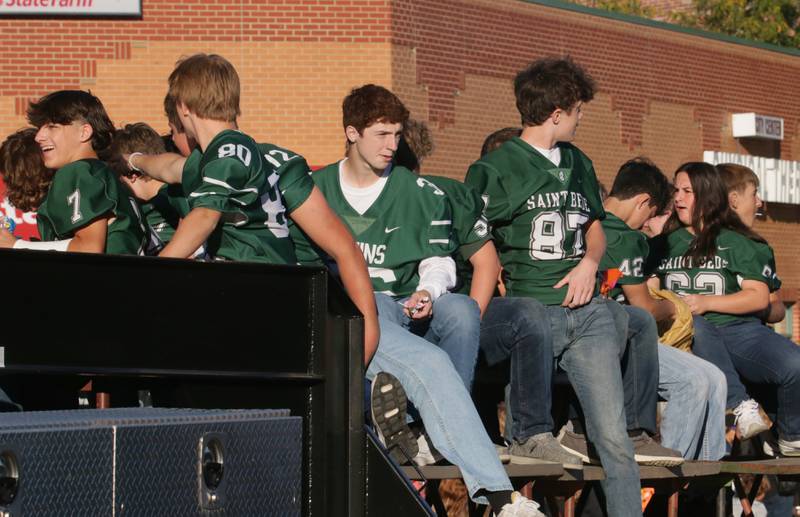 St. Bede football players ride in the Homecoming parade on Friday, Sept. 30, 2022 downtown Peru.