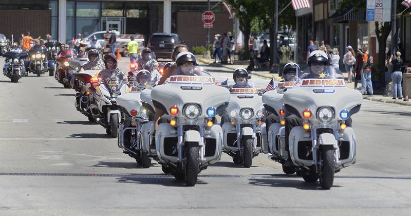 Medina Riders lead the way Saturday, June 18, 2022, down Main Street in Marseilles as the Illinois Motorcycle Freedom Run arrives in town. A ceremony at the Middle East Conflicts Wall followed the arrival.