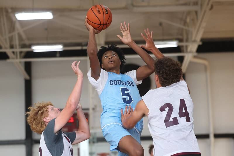 Plainfield South’s Kareem Parker puts up the shot against Morris at the 37th Morris Boys Shootout on Tuesday, June 25, 2024.