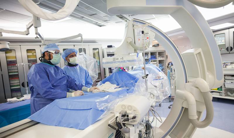 Morris Hospital Interventional Cardiologists Athar Saeed, M.D., and Syed Ahmed, M.D., performing a procedure in the Morris Hospital Cath Lab.