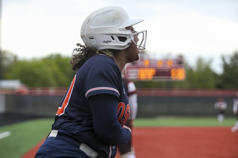Oswego's Jaelynn Anthony (20) reacts a after scoring a run during softball game between Oswego at Yorkville. May5, 2026 in Yorkville.