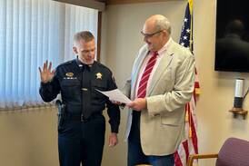 Morrison swears in new police chief