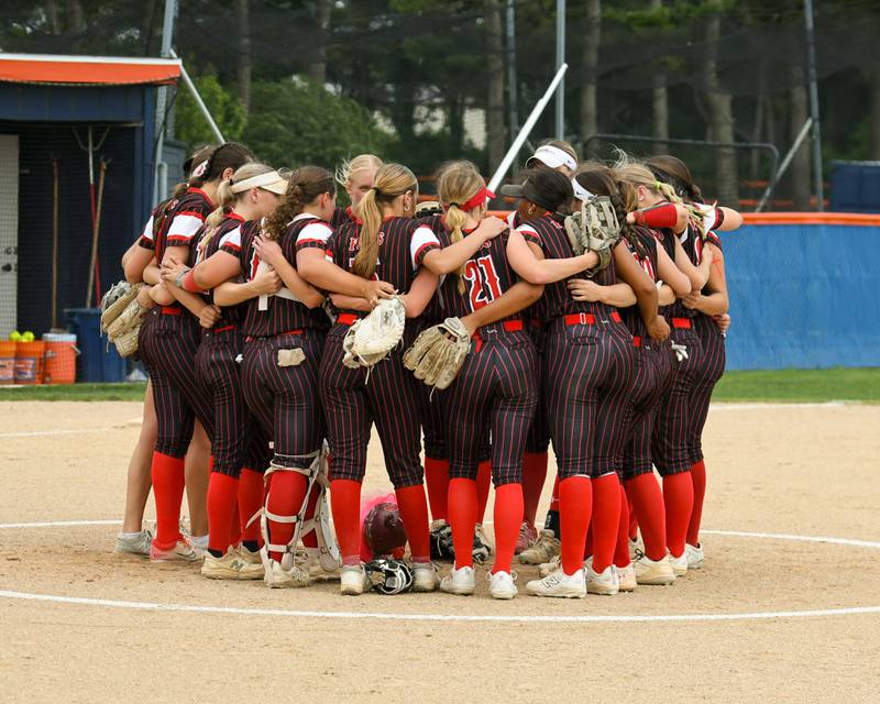 Yorkville huddles around the pitcher’s mound before the Sectional semifinals game on Tuesday June 3, 2025, while taking on Oswego held at Oswego High School.