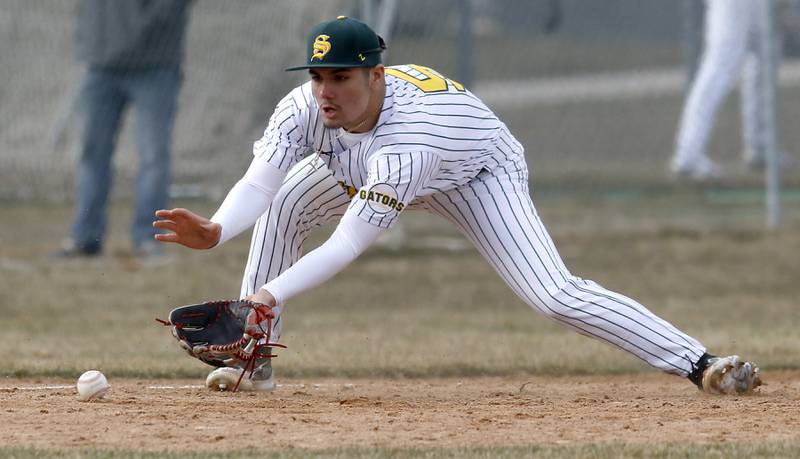 Crystal Lake South’s Yandel Ramirez fields the ball  during a nonconference baseball game against Richmond-Burton Friday, March 24, 2023, at Crystal Lake South High School.