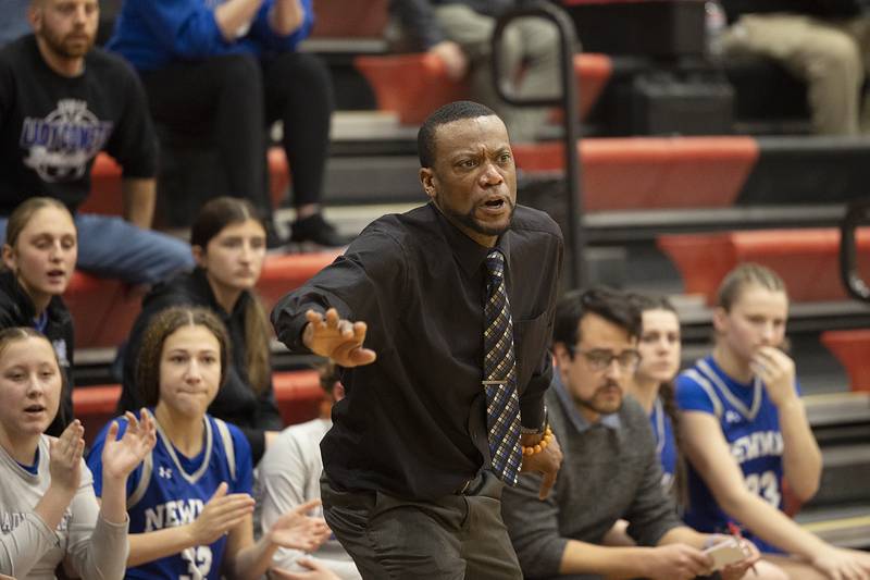 Newman coach Herb Martin leads his team against River Ridge Thursday, Feb. 20, 2025, during the Class 1A girls basketball regional at Forreston.