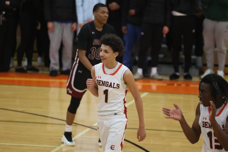 Plainfield East’s Kierre Miller pumps his fist in the final second of an overtime win against Plainfield North on Tuesday, Jan 14, 2025.