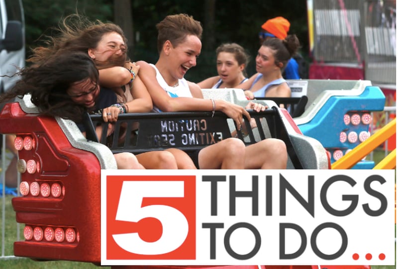 Lilly Clausen, 14, Maya Cook, 14, and Will Bajak, 14, all of Crystal Lake, ride on the Sizzler during Lakeside Festival on Friday, July 1, 2022, at the Dole and Lakeside Arts Park, 401 Country Club Road in Crystal Lake.