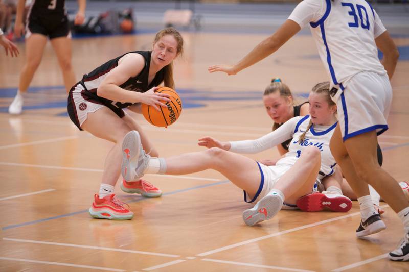 Prairie Ridge's Isabella Militello picks up the loose ball against St. Charles North at the Burlington Central Tournament on Tuesday, Nov. 19,2024 in Burlington.