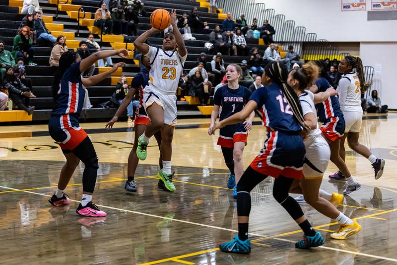 Joliet West's Keniya Foster takes a shot during a varsity girls basketball game against Romeoville at Joliet West on Dec. 11, 2025.