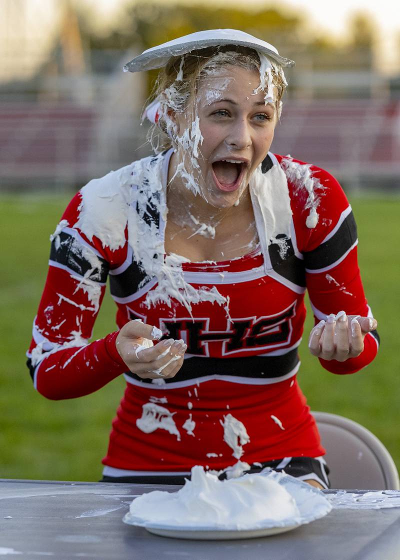 Evelyn Bryant reacts to getting covered in whip cream as a result of missing a trivia question during the pep rally at Richard Nesti Stadium on September 26, 2024.