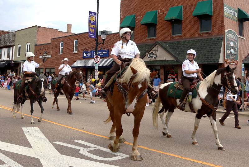 Members from the Kane County Mounted Rangers participate in the annual Elburn Days Parade on Friday, Aug. 16, 2024.