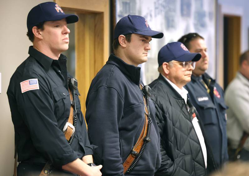 Fellow firefighters are on hand to watch Carlos Aburto and KeeLey Meyer be sworn in as firefighters at the Sycamore Fire Department Monday, April 1, 2024, during the Sycamore City Council meeting in the chambers at Sycamore Center.