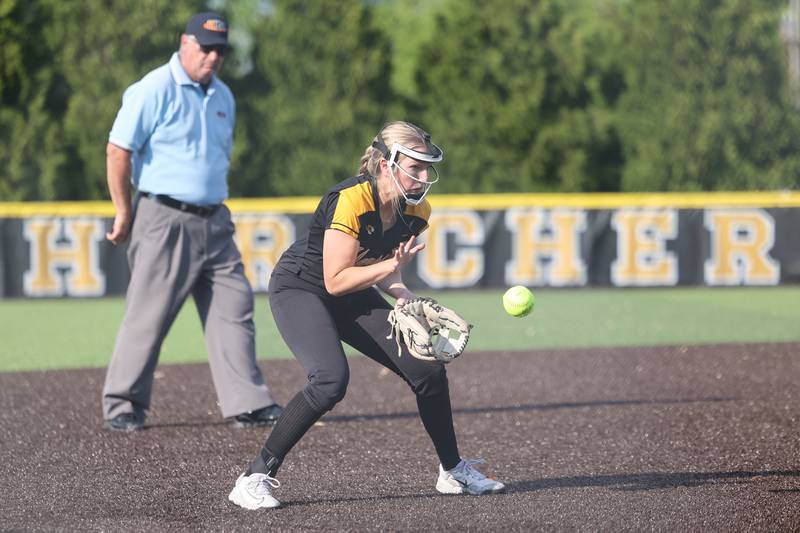 Herscher's Addy Whitaker fields a hit to third base during the Tigers' 13-6 victory against Central on Wednesday, May 14, 2025.