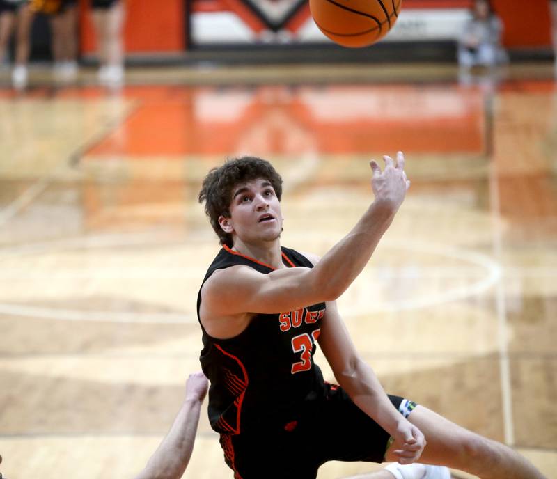 Wheaton Warrenville South's Luca Carbonaro puts up a shot during a Class 4A St. Charles East Sectional semifinal against Geneva on Wednesday, March 5, 2025 in St. Charles.