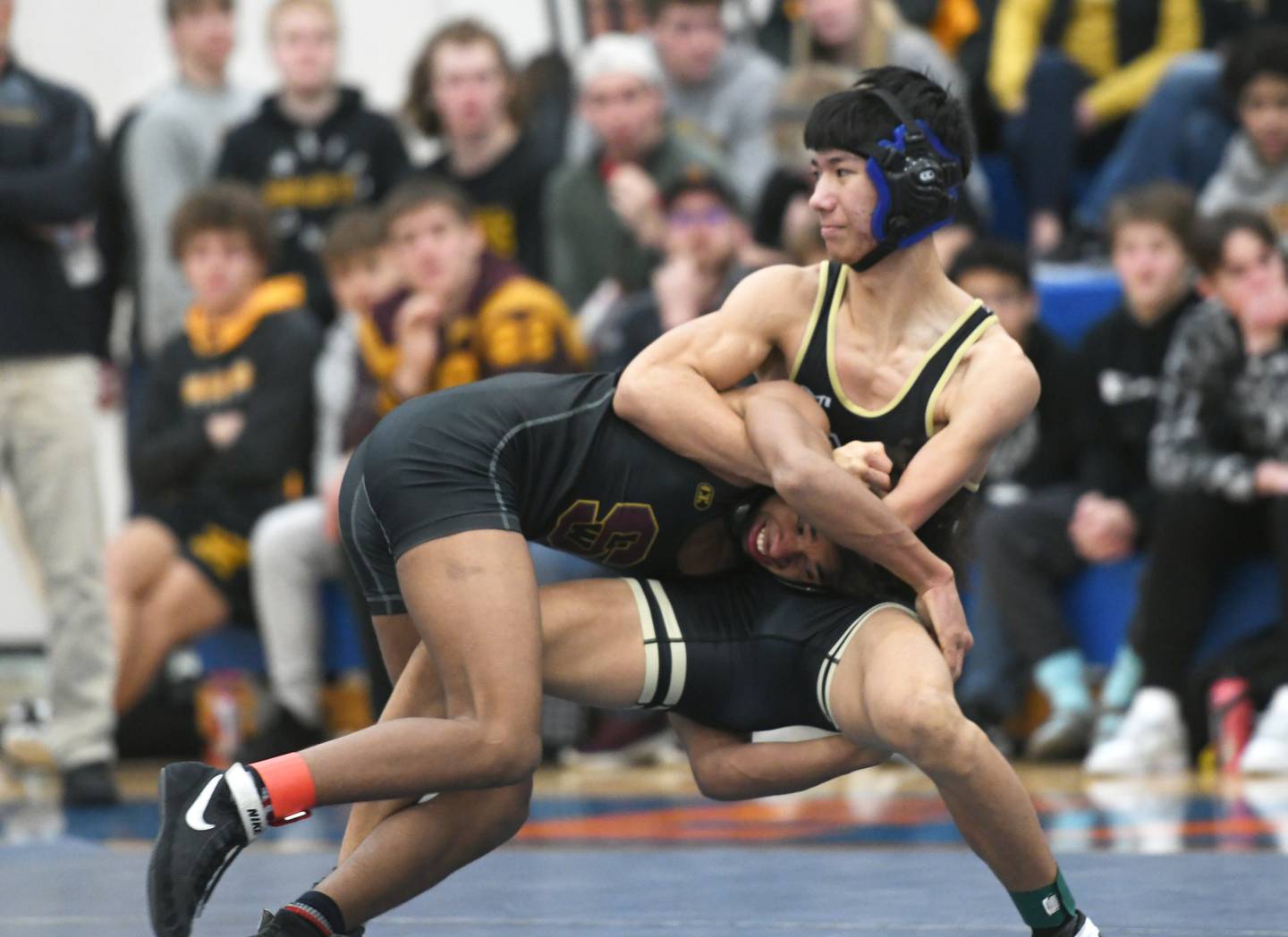 Polo-Forreston's Lucas Nelson (right) wrestles Lena-Winslow's Mauricio Glass in the third-place match at 132-pounds at the 1A Polo Wrestling Regional held in Lanark held at Eastland High School on Saturday, Feb. 4.