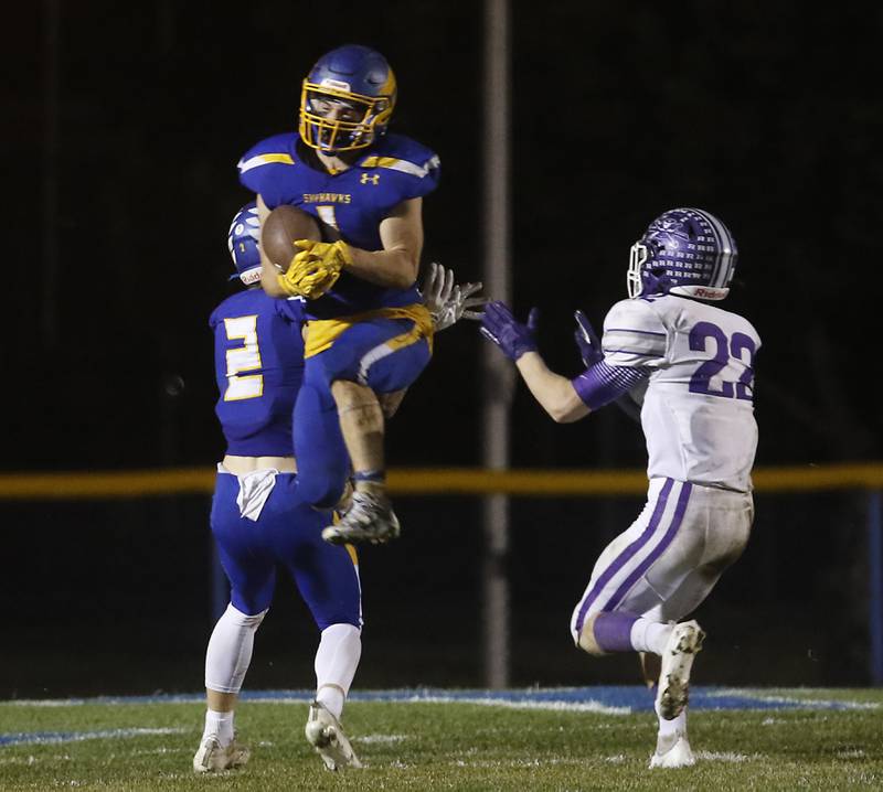 Johnsburg's Jake Metze intercepts a pass and the end of the second quarter during a IHSA Class 4A second round playoff football game Friday, Nov. 4, 2022, between Johnsburg and Rochelle at Johnsburg High School in Johnsburg.