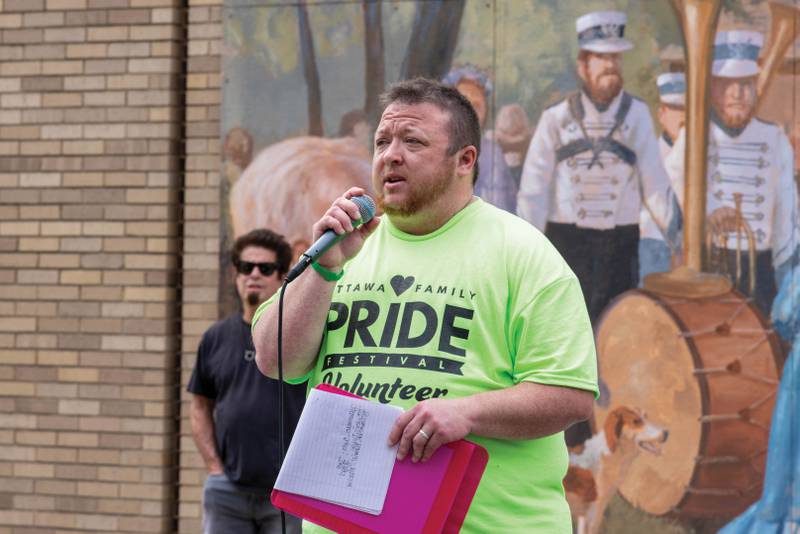 Ottawa Family Pride Festival organizer Dylan Conmy speaks during the inaugural event in 2022. The festival serves as a fundraiser for Youth Outlook to assist LGBTQ+ adolescents.