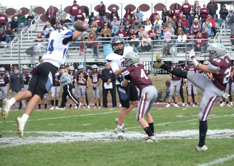 Eastland-Pearl City's Brody Simons (44) blocks a Rockridge punt during 2A state football playoffs action on Saturday, Nov. 2, 2024 at Eddington.