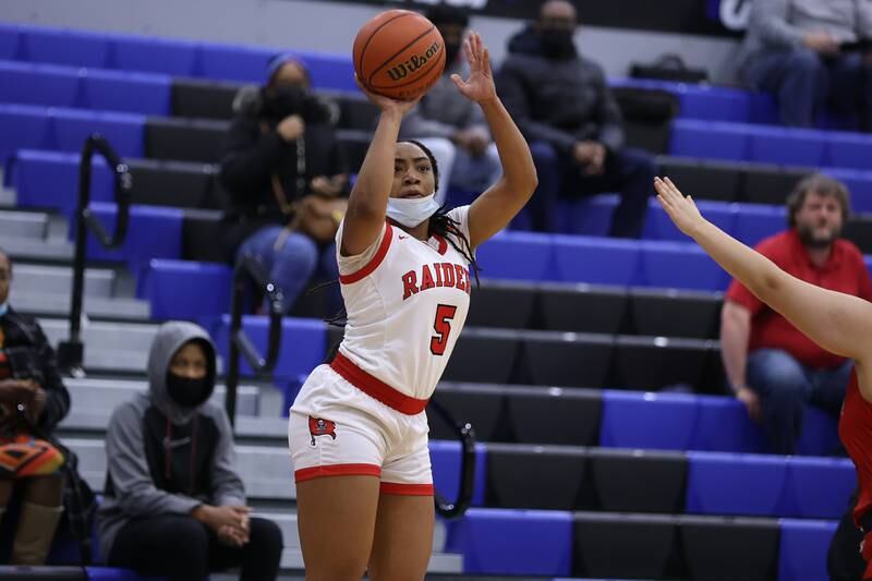 Bolingbrook’s Kennedi Perkins puts up a three point shot against Eisenhower in the Class 4A Lincoln-Way East Regional semifinal. Monday, Feb. 14, 2022, in Frankfort.
