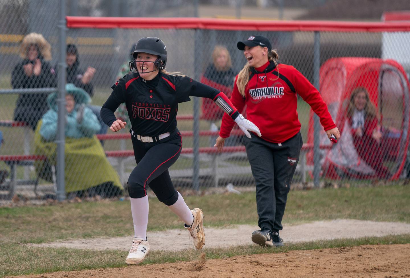 Yorkville's Madi Reeves (2) rounds third after homering against Neuqua Valley during a softball game at Yorkville High School on Wednesday, April 6, 2022.