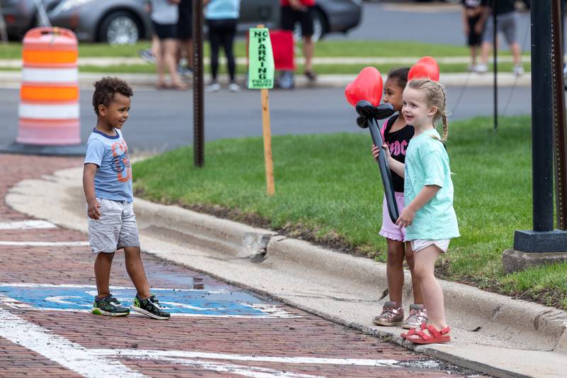 (left to right) Grayson Rapp talks to Pierson Rapp and Jovy Comerford at the annual Shrimp Fest on Saturday, June 7, 2025 at Rotary Park in Princeton.