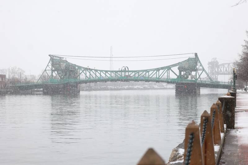 Traffic crosses the Jefferson Street Bridge as afternoon rain turns to evening snow on Tuesday, Jan. 9th, 2024.