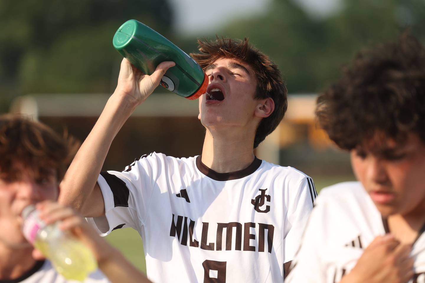 Joliet Catholic's Liam Connolly cools down during a break in action against Providence on Aug. 21, 2023 in New Lenox.