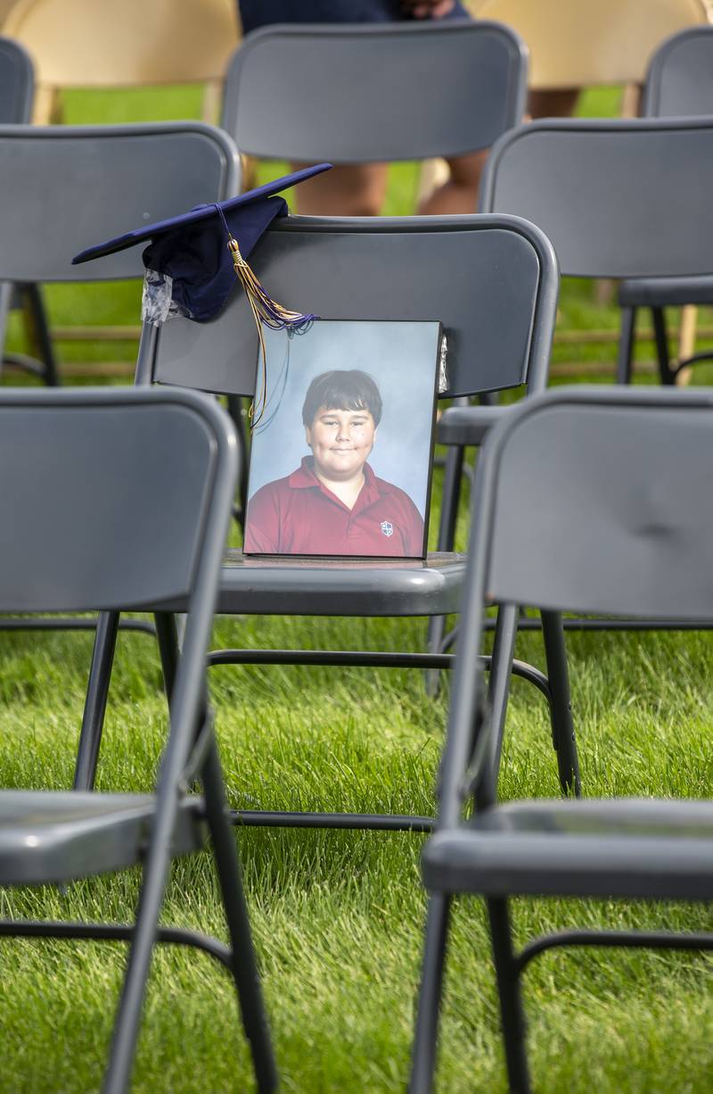 Drue French's photograph represents him at Sunday's Marquette Academy Class of 2022 graduation ceremony where he was awarded a diploma posthumously.