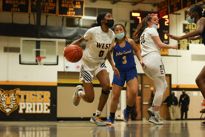 Joliet West’s Lisa Thompson makes a move to the basket against Joliet Central. Tuesday, Feb. 8, 2022, in Joliet.