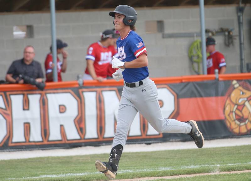 Crystal Lake Central's James Dreher smiles while running home after hitting a home run during the ICA Senior Baseball All Star Game on Monday, June 30, 2025 at Schweickert Stadium in Peru.