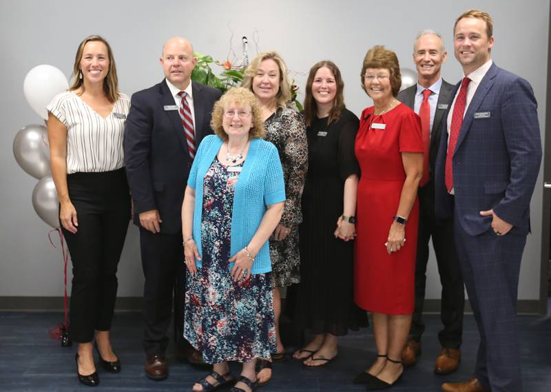 Lighted Way board of Directors pose for a photo during the ribbon cutting and dedication on Saturday, Aug. 5, 2023 in La Salle.