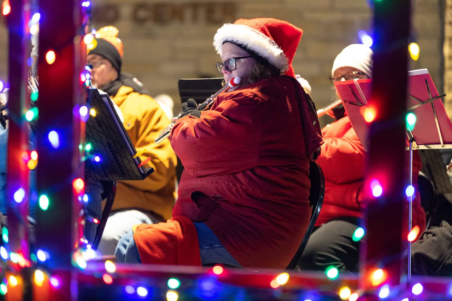 Batavia Community Band member Laurie Lundborg of Batavia performs Christmas carols during the Celebration of Lights at the Batavia Riverwalk on Sunday, Dec. 1, 2024.