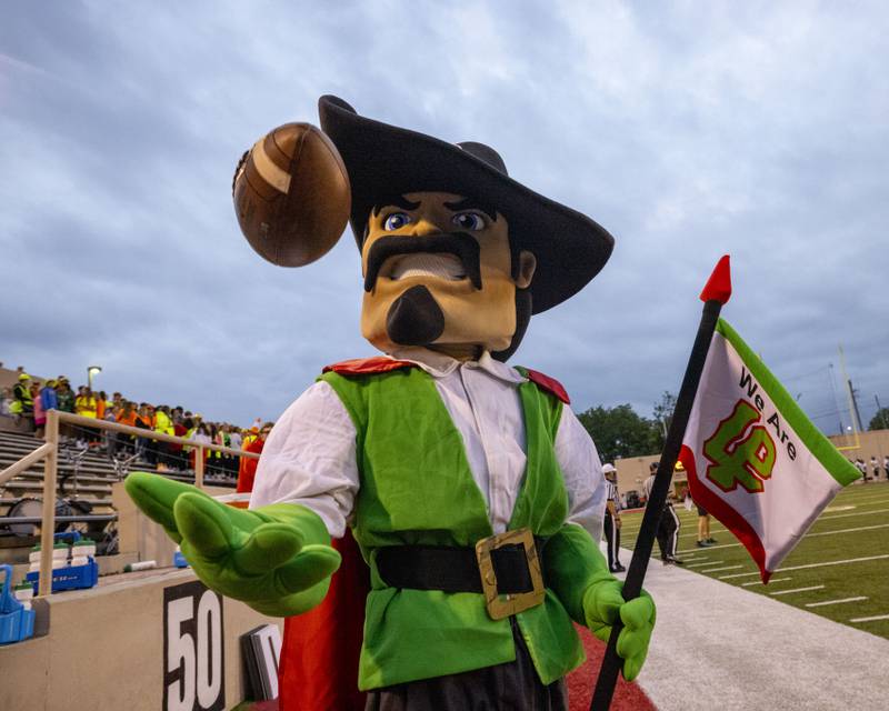 The Cavalier mascot tosses a football prior to the start of the game against Woodstock north on September 8, 2023.