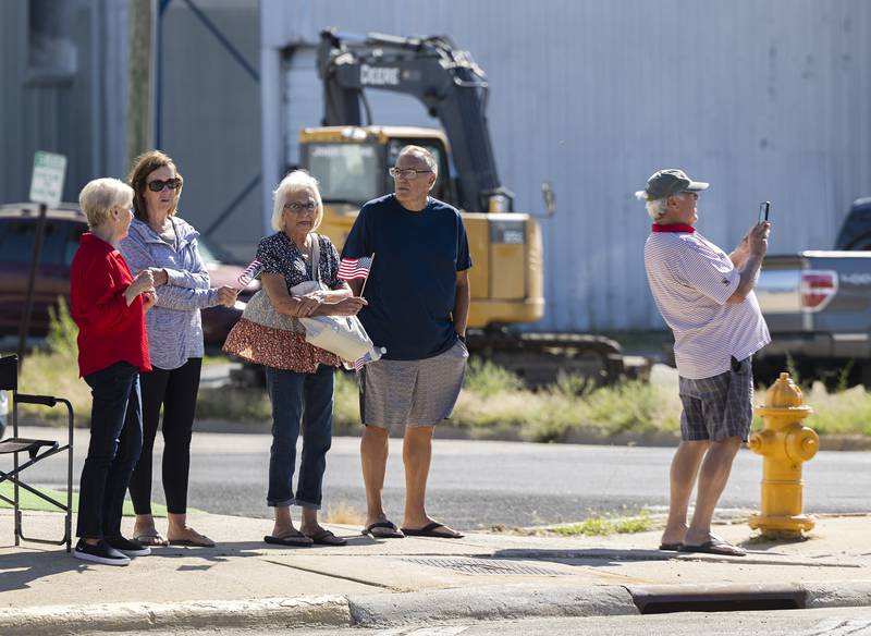 Watchers line the streets of Rock Falls Thursday, August 31, 2023 as the Vietnam Traveling Memorial Wall makes its way into town.