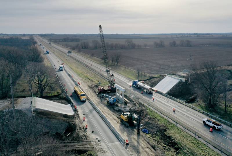 Workers with D Construction build a new overpass on County Road 500 East over Interstate 80 on Tuesday, March 12, 2024  in Bureau County. The Illinois Department of Transportation announced a two-year, $36.8 million construction project on nearly 10 miles of Interstate 80 in Bureau County. Resurfacing will take place on I-80 from the Bureau-Henry County line to east of the Route 40 interchange (exit 45).