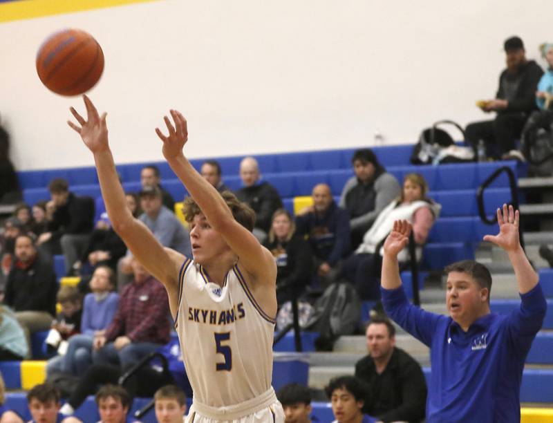 Johnsburg's Kyle Patterson shoots a three-pointer during a Kishwaukee River Conference boys basketball game against Woodstock Tuesday, Jan. 31, 2023, at Johnsburg High School.