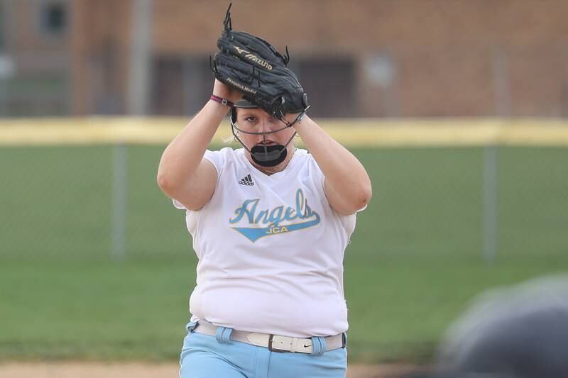 Joliet Catholic’s Nina Sebahar winds up for the delivery against Plainfield South on Wednesday, April 10, 2024.