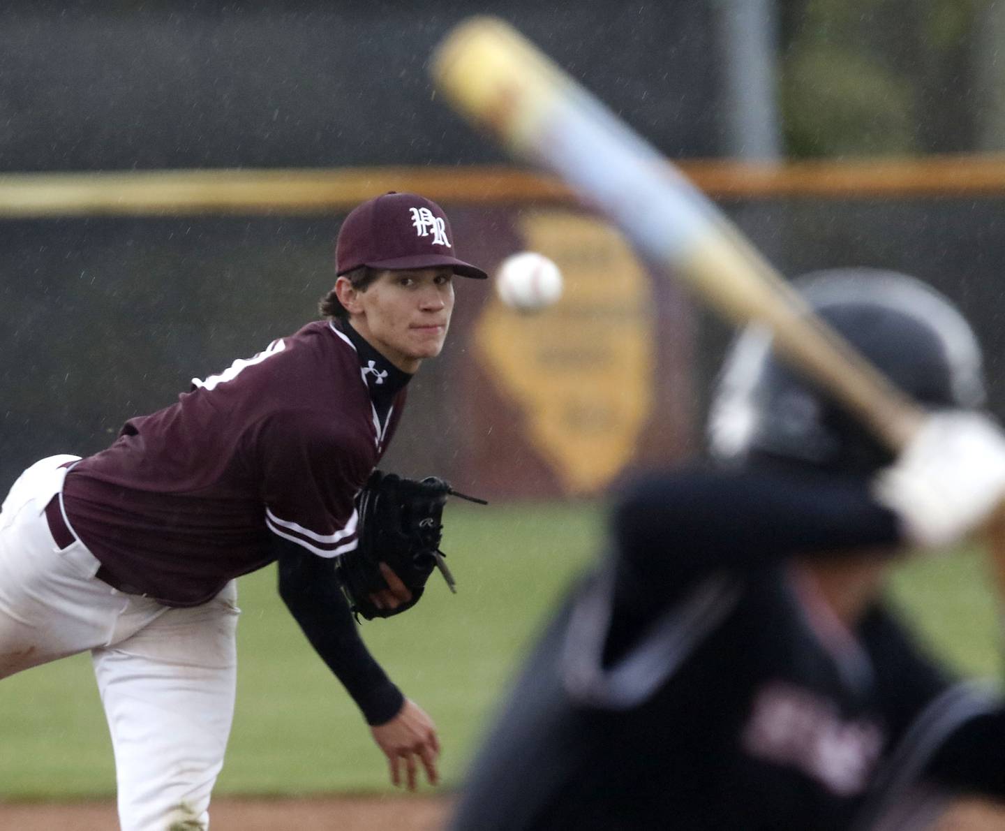Prairie Ridge's Jack Dahlem throws a pitch to Huntley's Leo Bianchin during a Fox Valley Conference baseball game on Friday, May 1, 2026, at Prairie Ridge High School.
