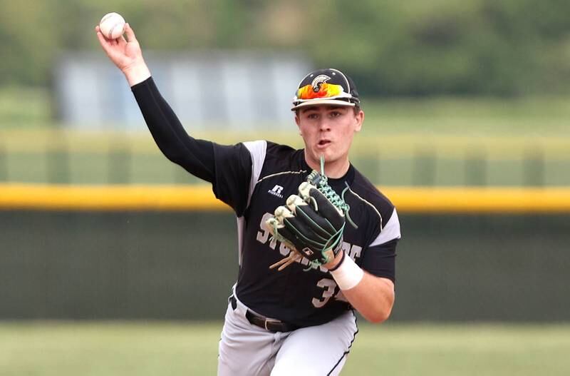 Sycamore's Joey Puleo throws to first to record an out during their Class 3A regional semifinal against St. Francis Thursday, June 1, 2023, at Kaneland High School in Maple Park.