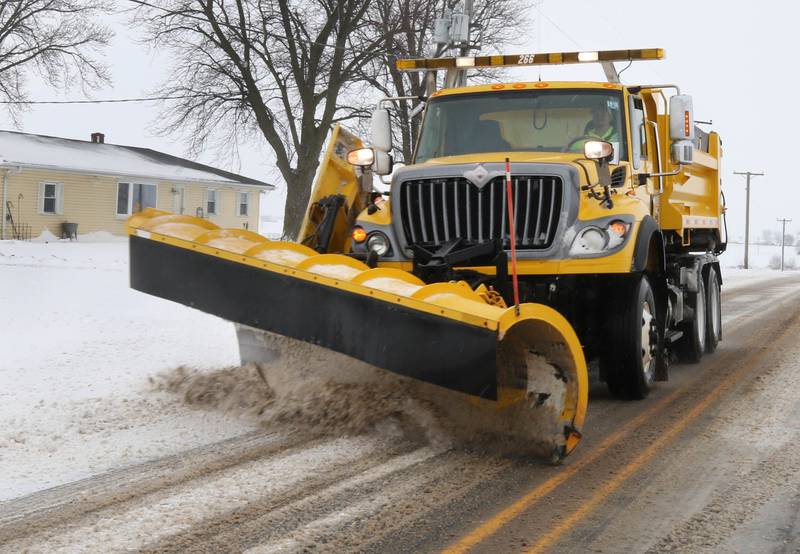 A snow plow makes its way down Route 23 Friday, Jan. 12, 2024, just south of DeKalb. Several inches of snow blanketed DeKalb County Friday on top of the 6 inches that fell on the area earlier this week.