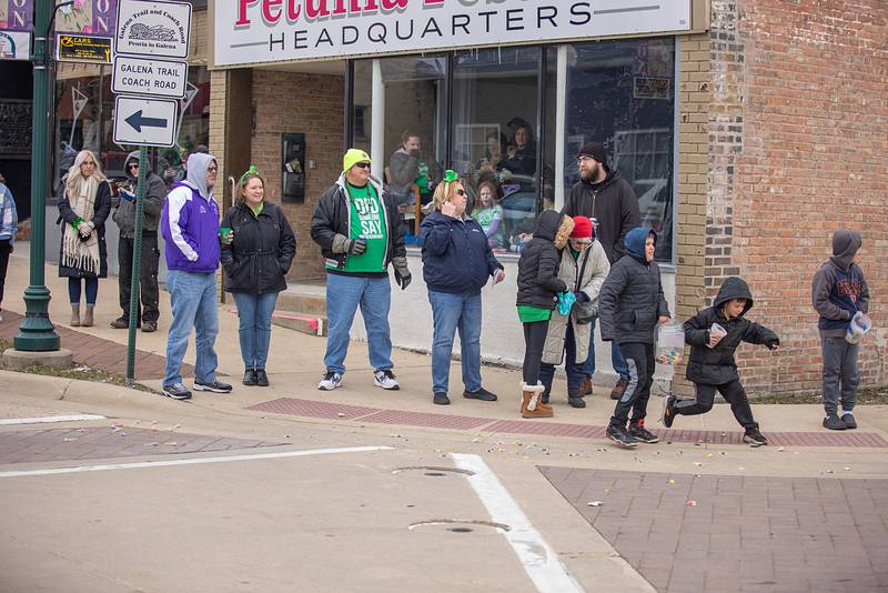 Parade spectators watch as the Dixon St. Patrick's Day parade winds its way through downtown Dixon on Saturday, March 18, 2023. The weather kept many folks home, but fin times were still had.