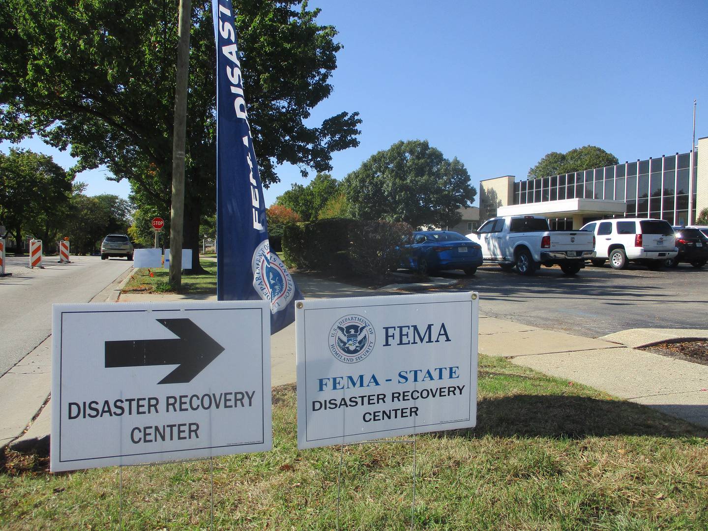 Signs and a banner point motorists to the location of the Federal Emergency Management Agency Disaster Recovery Center that opened Friday in the Will County Center for Community Concerns building at 2455 Glenwood Ave. in Joliet. Oct. 4, 2024