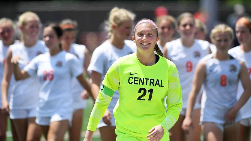 Crystal Lake Central goalkeeper Addison Cleary smiles while leadeing the Tigers to the trophy presentation after defeating De La Salle in the IHSA girls Class 2A third-place soccer game at North Central College in Naperville on Saturday, June 3, 2023.