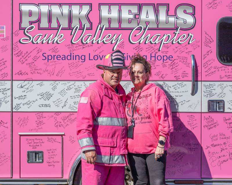 Brian Tribley of the Pink Heals, Rock Falls chapter and Kathy Steinz pose for photo on Wednesday, Oct. 8, 2025 at the LaSalle County Nursing Home in Ottawa.