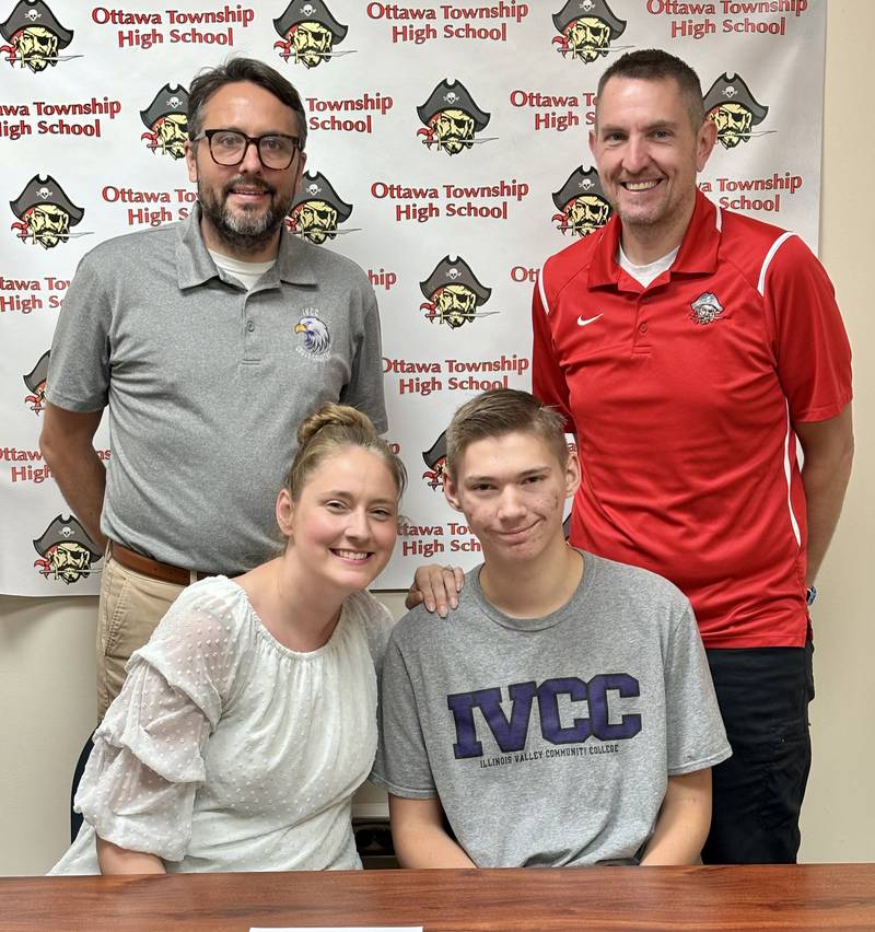 Ottawa's Alexander McCalmont (seated, right) signed a letter of intent to run cross country at IVCC. He was joined by his mother (seated), Lindsay, and (standing from left) IVCC coach Matt Baker and Ottawa coach Dan Heaver.
