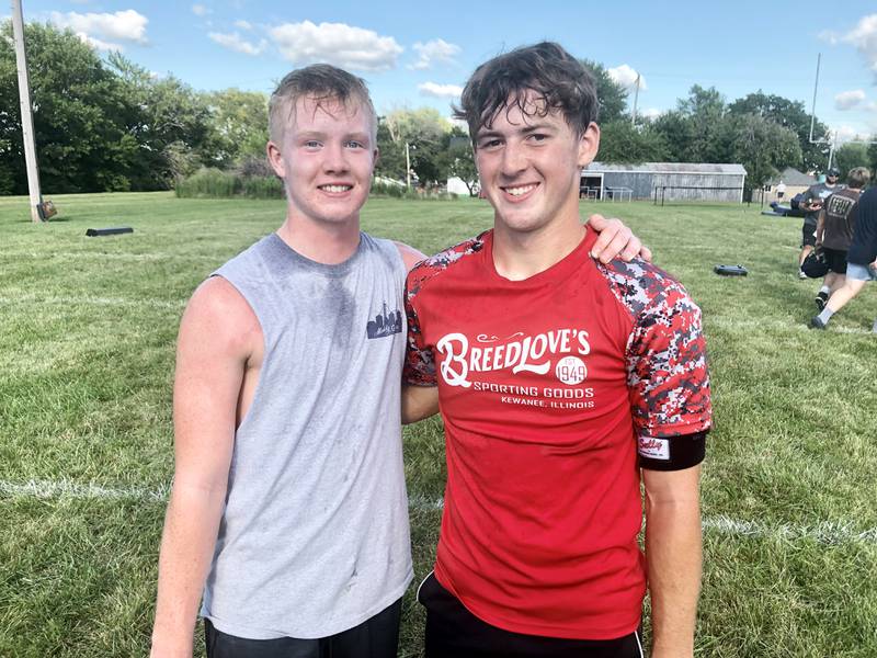 Bryce Helms (left) and Isaac Attig are vying for the starting quarterback duties for the Bureau Valley Storm. Attig say it's a friendly competition and they are helping each other out.