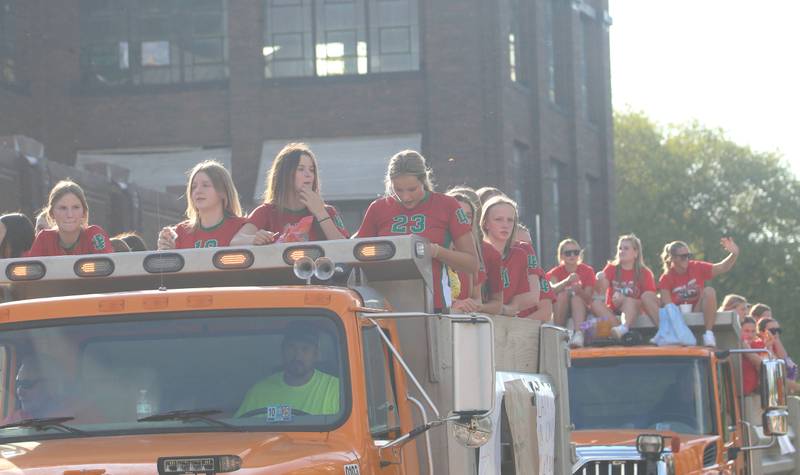 Members of the L-P boys volleyball team ride a float during the L-P homecoming parade on Thursday, Oct. 2, 2025 downtown Peru.