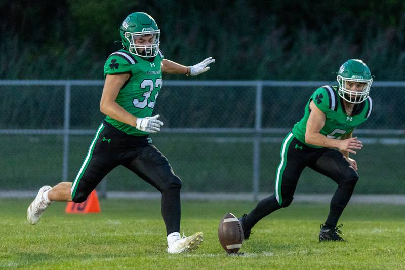 Cameron Shriey (33) of Seneca kicks onside kick on Friday, Aug 29, 2025 at Seneca High School in Seneca.